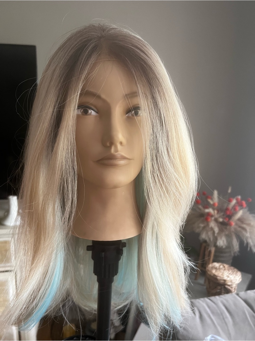 Blonde Women's Styling Wig with Pastel Blue Accents Gemini is the name